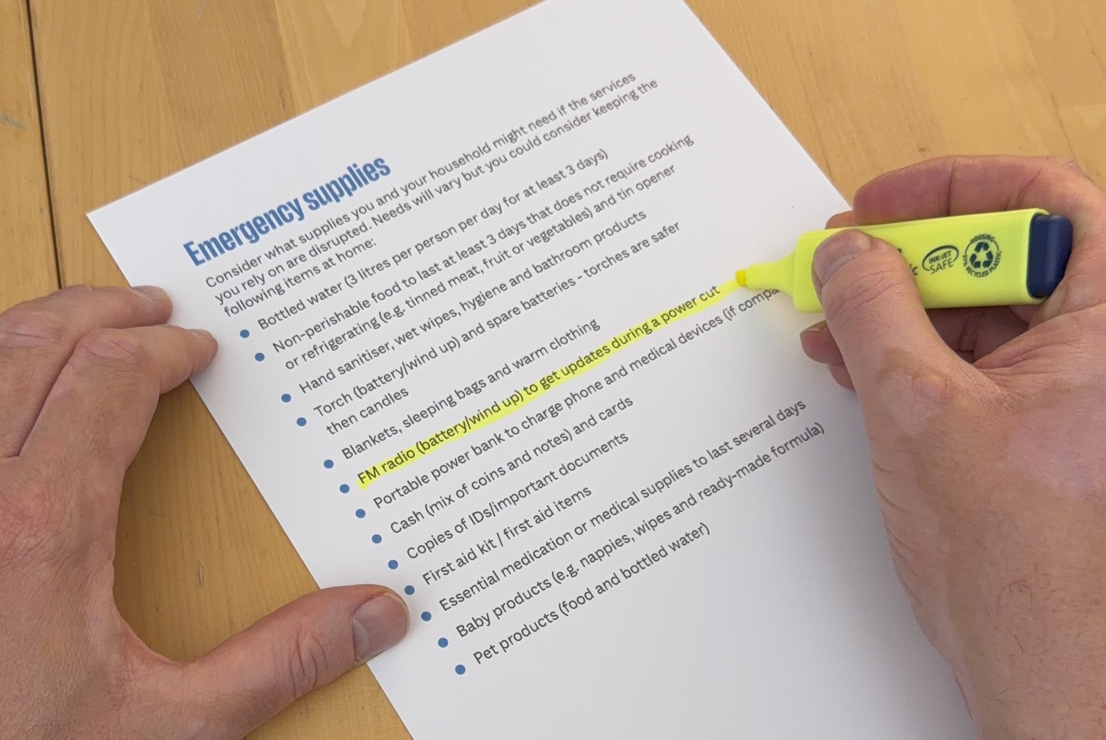 The government's Emergency supplies checklist, with the line "FM radio (battery/wind up) to get updates during a power cut" highlighted in yellow